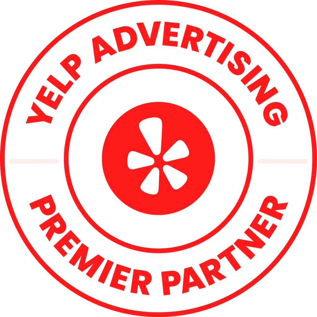 A yelp advertising partner logo in a red circle